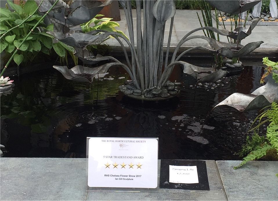 Decorative pond examples on the trade stand of sculpture Ian Gill